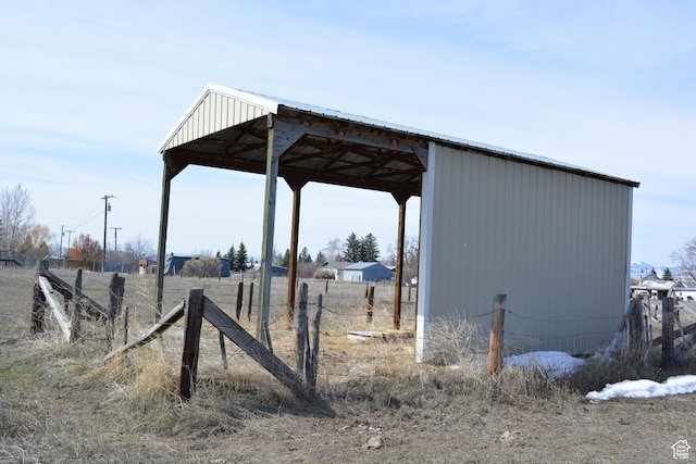 595 N 6th St, Montpelier, ID 83254 - view of outbuilding with a detached carport and fence