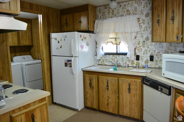 595 N 6th St, Montpelier, ID 83254 - kitchen with a sink, extractor fan, brown cabinets, white appliances, and light countertops