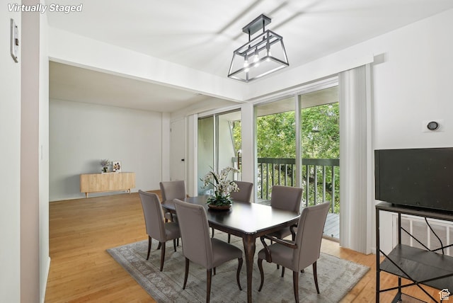 dining room with light wood-style floors