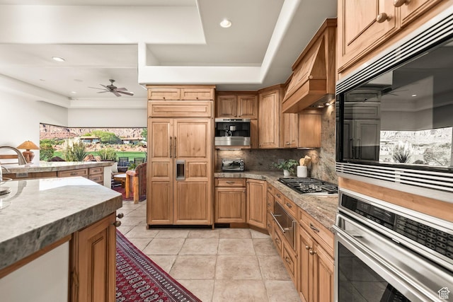 2410 W Entrada Trl Unit 15, St George, UT 84770 - kitchen with light tile patterned flooring, ceiling fan, stainless steel appliances, backsplash, and recessed lighting