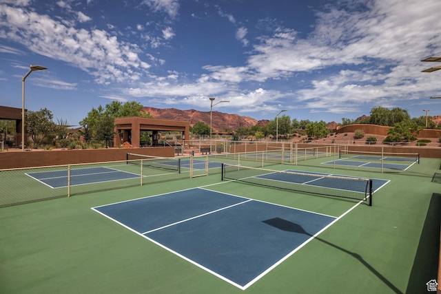 2410 W Entrada Trl Unit 15, St George, UT 84770 - view of sport court featuring fence, community basketball court, and a mountain view