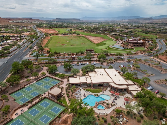 2410 W Entrada Trl Unit 15, St George, UT 84770 - drone / aerial view with view of golf course and a mountain view