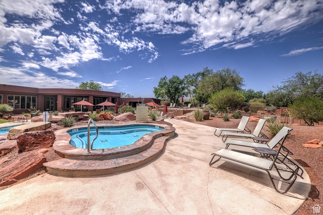 2410 W Entrada Trl Unit 15, St George, UT 84770 - view of pool with fence, a patio area, and a swimming pool