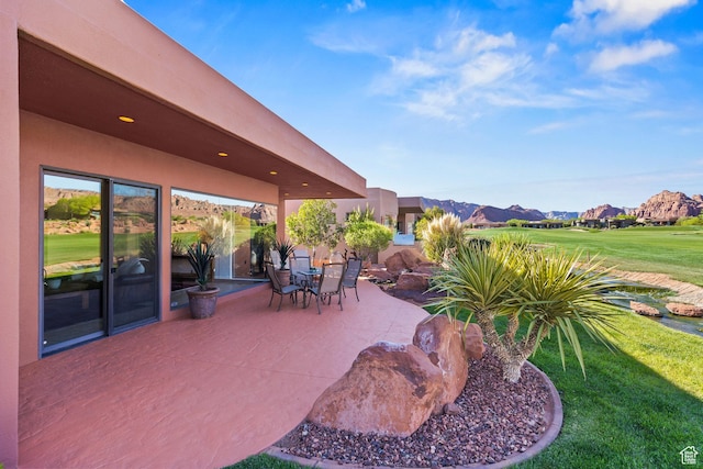 2410 W Entrada Trl Unit 15, St George, UT 84770 - view of patio / terrace with golf course view
