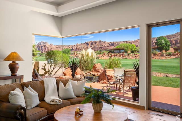 2410 W Entrada Trl Unit 15, St George, UT 84770 - interior space featuring a mountain view, visible vents, and tile patterned floors