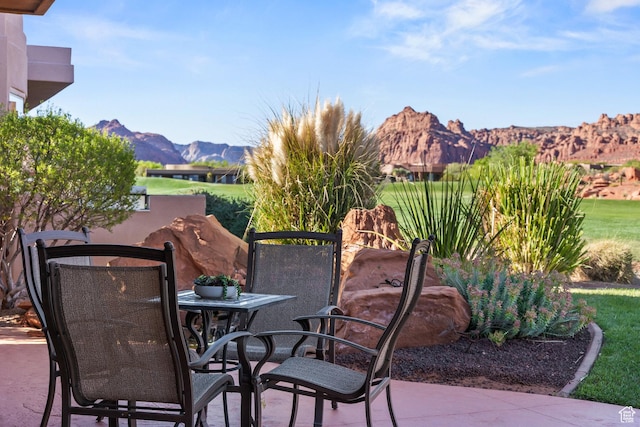 2410 W Entrada Trl Unit 15, St George, UT 84770 - view of patio with a mountain view