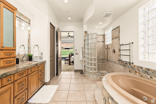 2410 W Entrada Trl Unit 15, St George, UT 84770 - ensuite bathroom with a bath, vanity, tile patterned flooring, a walk in shower, and recessed lighting