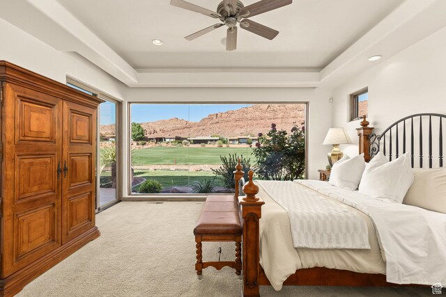 2410 W Entrada Trl Unit 15, St George, UT 84770 - bedroom with recessed lighting, multiple windows, access to exterior, and carpet