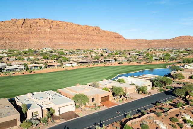 2410 W Entrada Trl Unit 15, St George, UT 84770 - bird's eye view featuring a water and mountain view, a residential view, and view of golf course