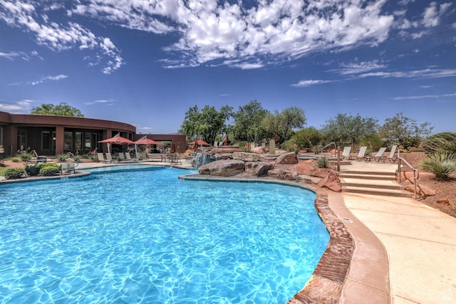 2410 W Entrada Trl Unit 15, St George, UT 84770 - community pool with a patio area