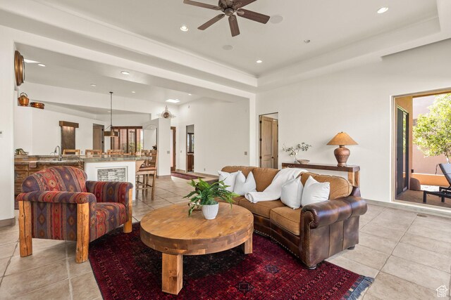 2410 W Entrada Trl Unit 15, St George, UT 84770 - living area with a raised ceiling, light tile patterned floors, a ceiling fan, and recessed lighting