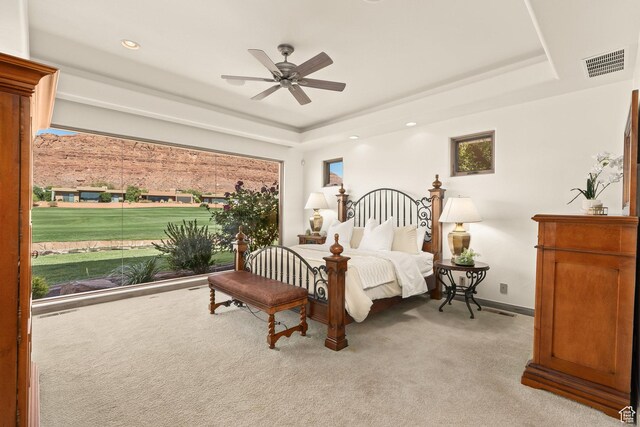 2410 W Entrada Trl Unit 15, St George, UT 84770 - bedroom with baseboards, visible vents, recessed lighting, light colored carpet, and a raised ceiling