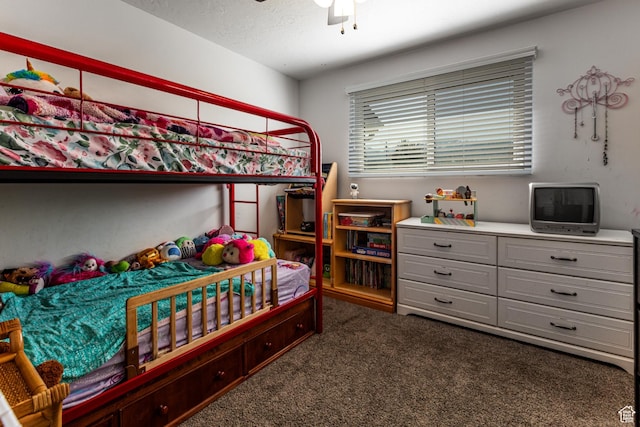 bedroom featuring carpet flooring and a ceiling fan