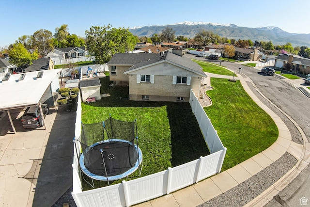 bird's eye view with a mountain view and a residential view