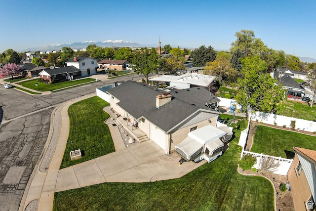 birds eye view of property with a residential view