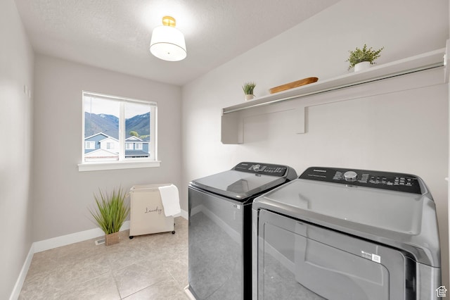227 N 250 E, Salem, UT 84653 - washroom featuring laundry area, light tile patterned floors, independent washer and dryer, baseboards, and a textured ceiling