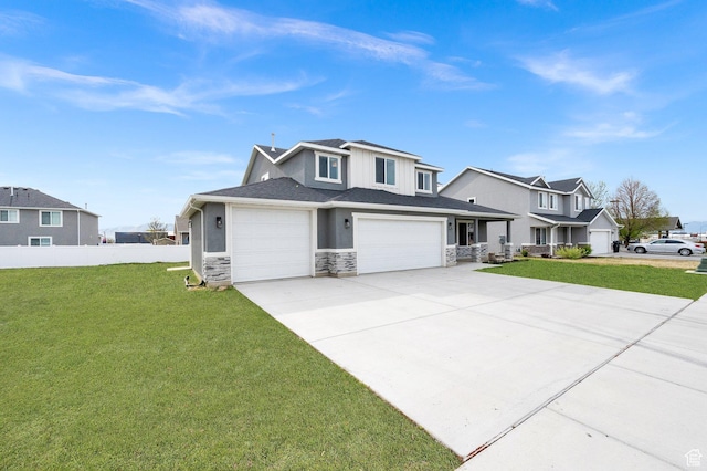 227 N 250 E, Salem, UT 84653 - view of front of home with driveway, fence, a front yard, and stone siding