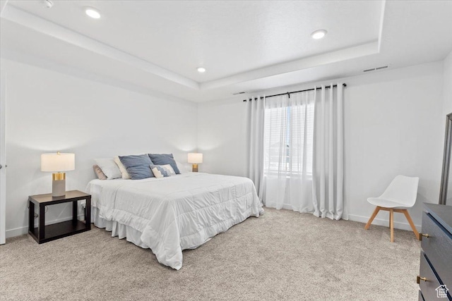 1158 E Bearing Dr S, Saratoga Springs, UT 84045 - bedroom featuring light carpet, visible vents, and a raised ceiling