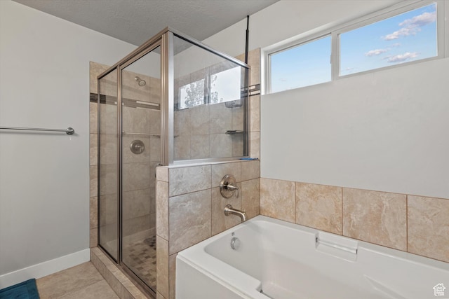 286 S Bing Cherry Way, Layton, UT 84040 - bathroom with a shower stall, a bath, and tile patterned flooring
