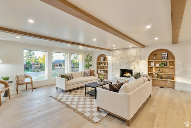 1075 S Alton Way E, Salt Lake City, UT 84108 - living area with beamed ceiling, light wood-type flooring, baseboards, and recessed lighting
