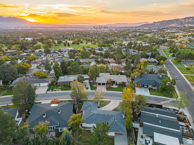 1075 S Alton Way E, Salt Lake City, UT 84108 - aerial view at dusk with a residential view and a mountain view