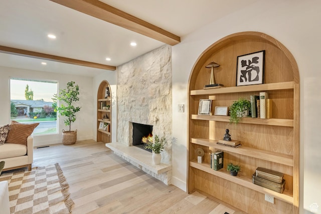 1075 S Alton Way E, Salt Lake City, UT 84108 - living area with baseboards, beam ceiling, and wood finished floors
