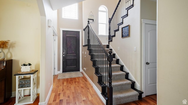 1229 E 1710 S, Spanish Fork, UT 84660 - entryway featuring stairs, light wood-style floors, and plenty of natural light