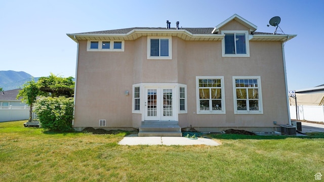 1229 E 1710 S, Spanish Fork, UT 84660 - rear view of property with fence, a lawn, french doors, and stucco siding