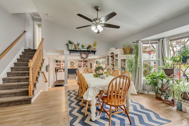 217 W 990 N, American Fork, UT 84003 - dining area with high vaulted ceiling, ceiling fan, stairs, and light wood-style flooring