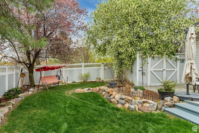 217 W 990 N, American Fork, UT 84003 - view of yard with a fenced backyard, an outdoor structure, and a storage shed