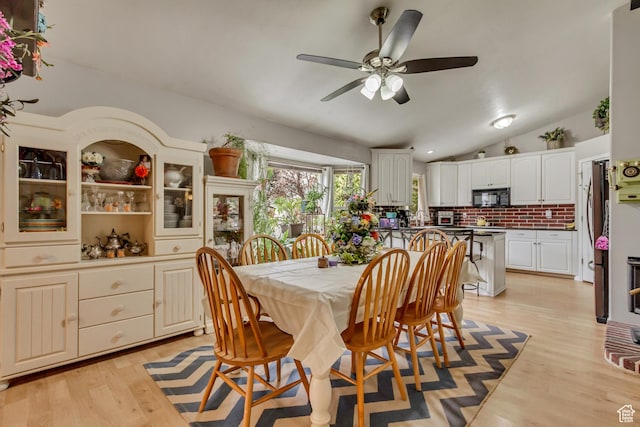 217 W 990 N, American Fork, UT 84003 - dining area with ceiling fan, lofted ceiling, and light wood-style floors