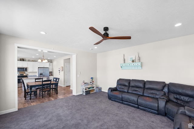 2671 E White Birch Dr, Eagle Mountain, UT 84005 - living area with dark carpet, a ceiling fan, baseboards, and recessed lighting