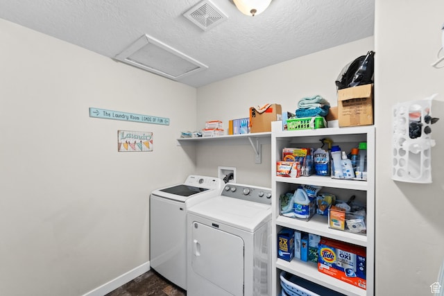 2671 E White Birch Dr, Eagle Mountain, UT 84005 - clothes washing area featuring a textured ceiling, attic access, laundry area, washing machine and dryer, and visible vents