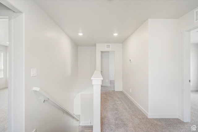 3509 N Gina St Unit 1230, Eagle Mountain, UT 84005 - hallway featuring an upstairs landing, light carpet, and recessed lighting