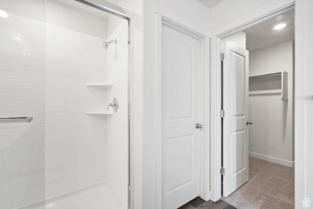 3509 N Gina St Unit 1230, Eagle Mountain, UT 84005 - bathroom featuring a stall shower and baseboards