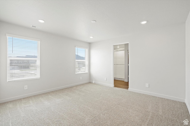 3509 N Gina St Unit 1230, Eagle Mountain, UT 84005 - carpeted spare room featuring baseboards and recessed lighting