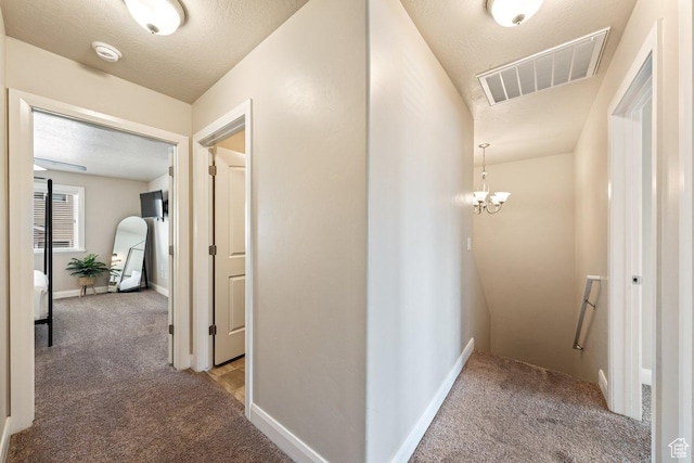 3030 N 125 E, Cedar City, UT 84721 - corridor featuring carpet, visible vents, baseboards, and an upstairs landing