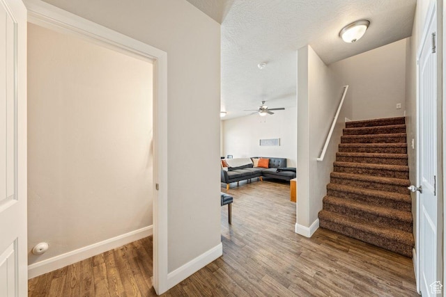 3030 N 125 E, Cedar City, UT 84721 - stairs featuring baseboards, wood finished floors, and ceiling fan