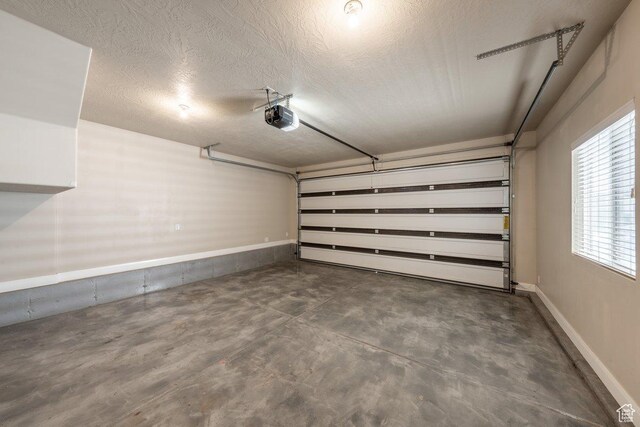3030 N 125 E, Cedar City, UT 84721 - garage featuring a garage door opener and baseboards