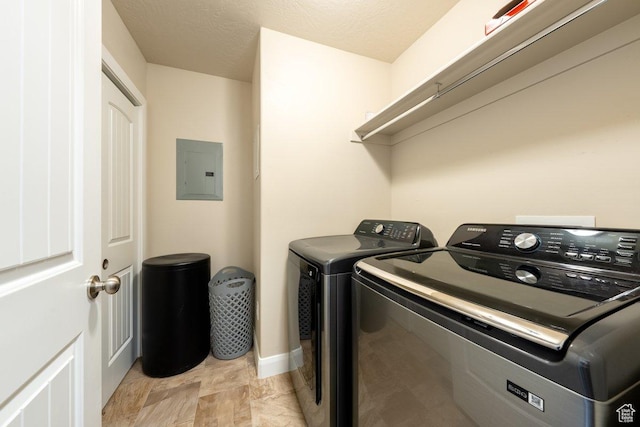 3030 N 125 E, Cedar City, UT 84721 - washroom featuring baseboards, electric panel, separate washer and dryer, and laundry area
