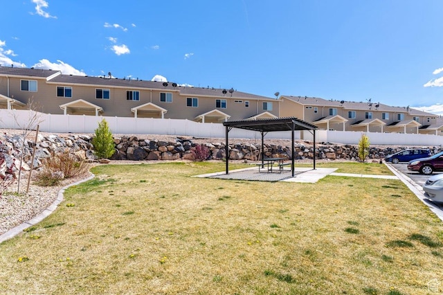 3030 N 125 E, Cedar City, UT 84721 - view of yard featuring a pergola, a residential view, a patio area, and a fenced backyard