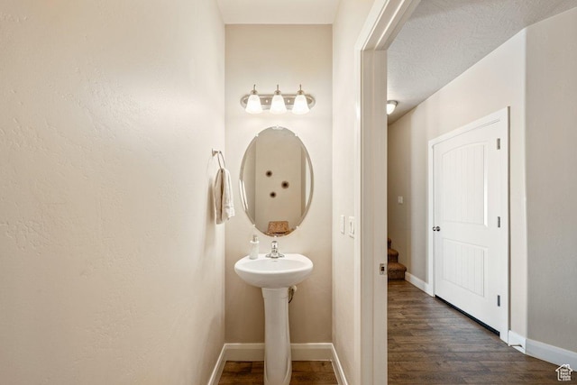3030 N 125 E, Cedar City, UT 84721 - bathroom featuring baseboards and wood finished floors