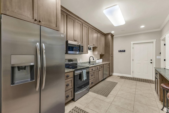 9470 N Canyon Heights Dr, Cedar Hills, UT 84062 - kitchen featuring crown molding, a sink, light tile patterned floors, appliances with stainless steel finishes, and light stone countertops