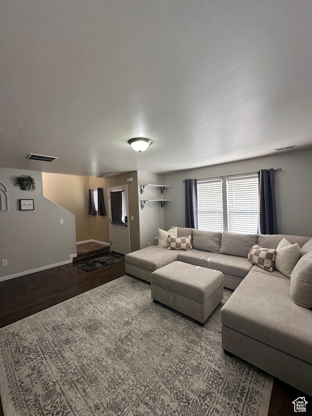 1688 N 80 E, Tooele, UT 84074 - living room featuring wood finished floors, visible vents, and baseboards