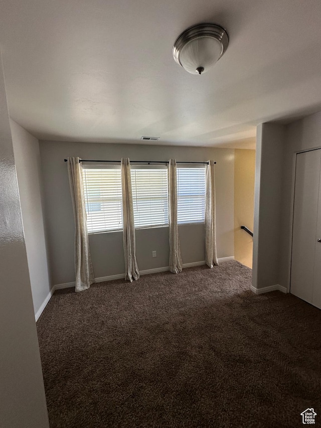 1688 N 80 E, Tooele, UT 84074 - carpeted empty room featuring a wealth of natural light, baseboards, and visible vents
