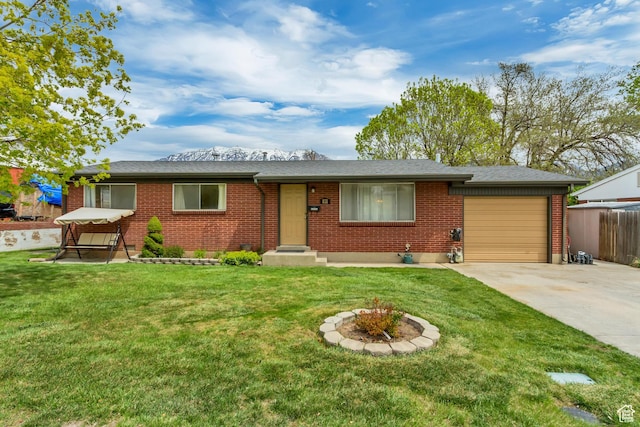 831 S 50 W, Orem, UT 84058 - ranch-style home with a front lawn, driveway, brick siding, and a garage