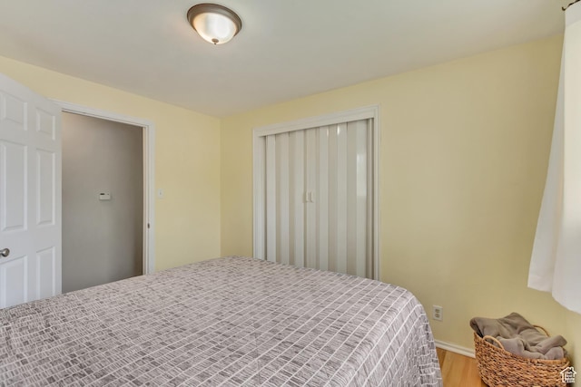 831 S 50 W, Orem, UT 84058 - bedroom featuring baseboards, wood finished floors, and a closet