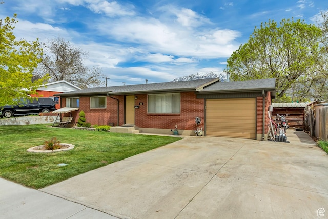 831 S 50 W, Orem, UT 84058 - ranch-style house with concrete driveway, a front lawn, fence, a garage, and brick siding