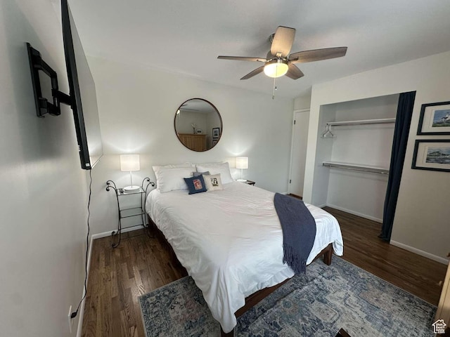 5843 S Fontaine Bleu Cir, Salt Lake City, UT 84121 - bedroom with wood finished floors, baseboards, a closet, and a ceiling fan