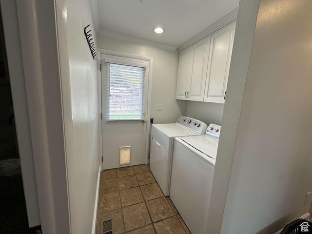 5843 S Fontaine Bleu Cir, Salt Lake City, UT 84121 - laundry area featuring visible vents, washer and clothes dryer, ornamental molding, and cabinet space